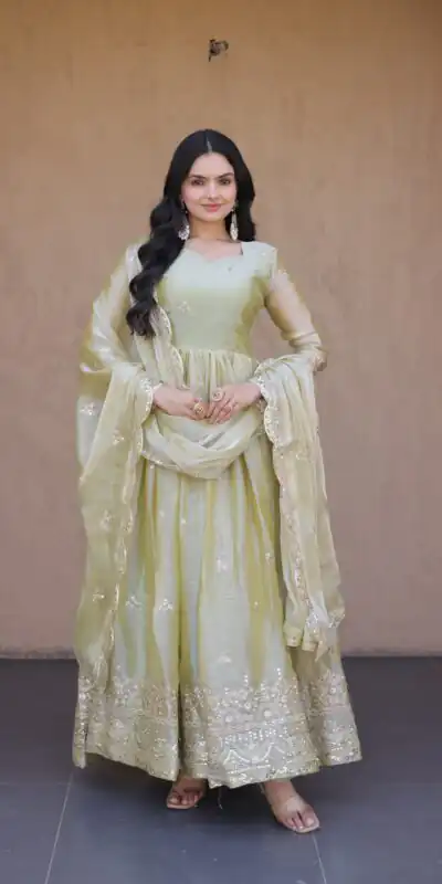 KA 1260 Light Pista Color Fendi Silk Gown with Embroidery Work & Zari Work. Now at just ₹2599. Delivery 4-6 Working Days. Shop now. | Bollywood Gowns, Creative Gowns, Designer Gowns, Embroidered Gowns, Gowns, Party Wear Gowns