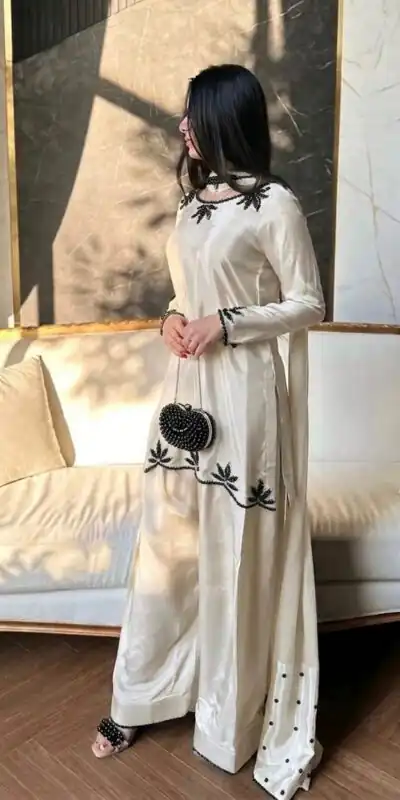 NF 1270 Off White Natural Crep Salwar Suit Brown with Embroidery Work. Exclusive Offer ₹1899. Delivery 4-6 Working Days. Shop now. | Casual Suits, Jump Suits, Creative suits, Designer Suits, Palazzo Suits, Party Wear Suits, Patiala Suits, Salwar suit, Straight Suits
