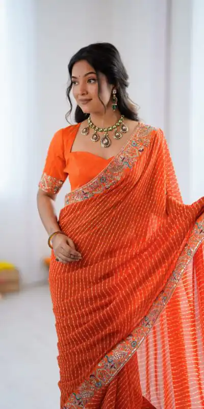 SP 79 Orange Faux Georgette Saree Perfect for Wedding, Party, Lohri, Engagement, Baby Shower – . Now at just ₹1999. Delivery 4-6 Working Days. Shop now | Creative Sarees, Bollywood Sarees, Designer Sarees, Embroidered Sarees, Ethnic Saree, Modern Digital sarees, Party Wear Sarees, Sarees