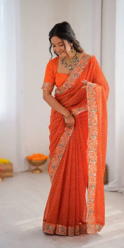 SP 79 Orange Faux Georgette Saree Perfect for Wedding, Party, Lohri, Engagement, Baby Shower – . Now at just ₹1999. Delivery 4-6 Working Days. Shop now | Creative Sarees, Bollywood Sarees, Designer Sarees, Embroidered Sarees, Ethnic Saree, Modern Digital sarees, Party Wear Sarees, Sarees