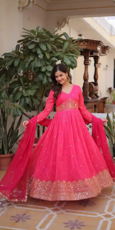 KA 1235 Pink Color Russian Silk Gown with Zari Work & Embroidery Work. Now at just ₹2499. Delivery 4-6 Working Days. Shop now. | Bollywood Gowns, Creative Gowns, Designer Gowns, Embroidered Gowns, Gowns, Party Wear Gowns