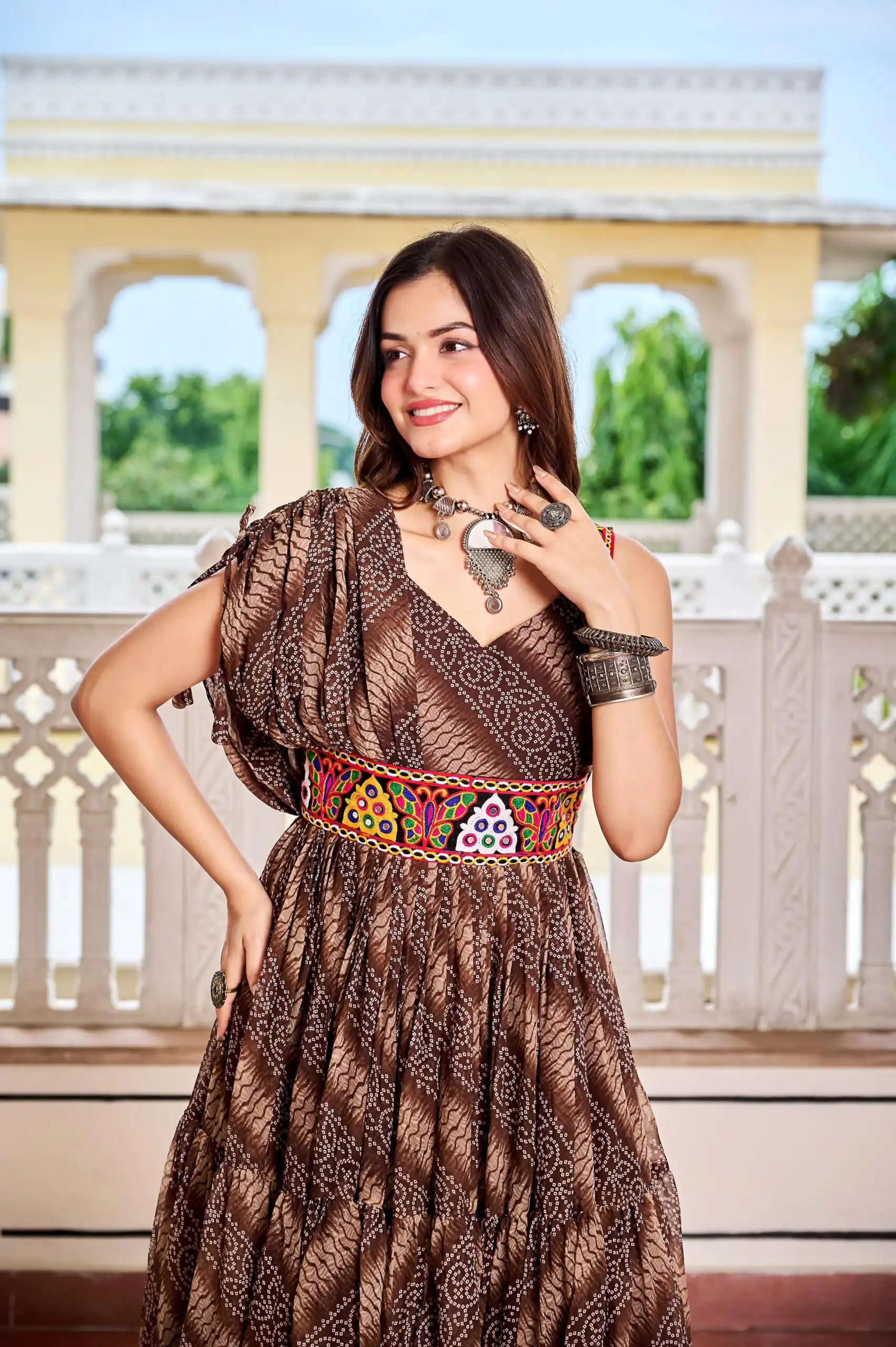 Aglow Brown Faux Georgette Printed Mirror Work Gown