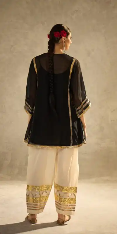 ST 1169 Black Black Chinon Salwar Suit with Gotta Patti Work. Available at ₹1849 only. Delivery 4-6 Working Days. Shop now. | Casual Suits, Jump Suits, Creative suits, Designer Suits, Palazzo Suits, Party Wear Suits, Patiala Suits, Salwar suit, Straight Suits