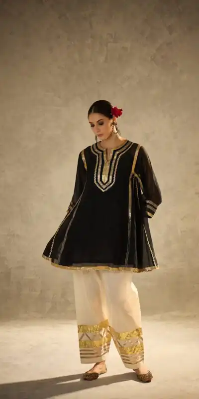 ST 1169 Black Black Chinon Salwar Suit with Gotta Patti Work. Available at ₹1849 only. Delivery 4-6 Working Days. Shop now. | Casual Suits, Jump Suits, Creative suits, Designer Suits, Palazzo Suits, Party Wear Suits, Patiala Suits, Salwar suit, Straight Suits