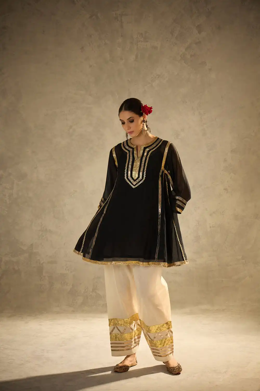 ST 1169 Black Black Chinon Salwar Suit with Gotta Patti Work. Available at ₹1849 only. Delivery 4-6 Working Days. Shop now. | Casual Suits, Jump Suits, Creative suits, Designer Suits, Palazzo Suits, Party Wear Suits, Patiala Suits, Salwar suit, Straight Suits