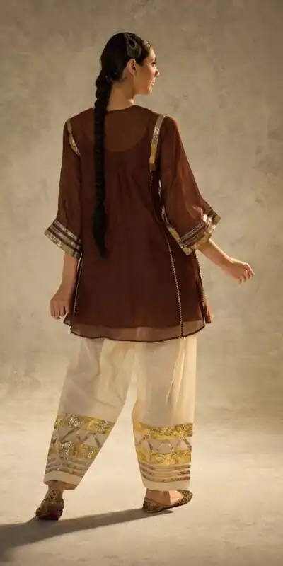 ST 1169 Rust Color Chinon Salwar Suit with Gotta Patti Work. Available at ₹1849 only. Delivery 4-6 Working Days. Shop now. | Casual Suits, Jump Suits, Creative suits, Designer Suits, Palazzo Suits, Party Wear Suits, Patiala Suits, Salwar suit, Straight Suits