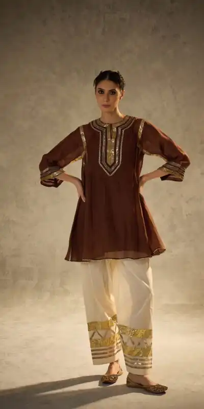 ST 1169 Rust Color Chinon Salwar Suit with Gotta Patti Work. Available at ₹1849 only. Delivery 4-6 Working Days. Shop now. | Casual Suits, Jump Suits, Creative suits, Designer Suits, Palazzo Suits, Party Wear Suits, Patiala Suits, Salwar suit, Straight Suits