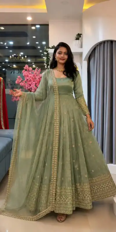 SSR 547 Pista in Crunchy Silk Embroidery Work & Lace Work Gown . Special Price ₹2399. Delivery 4-6 Working Days. Shop now. | Bollywood Gowns, Creative Gowns, Designer Gowns, Embroidered Gowns, Gowns, Party Wear Gowns