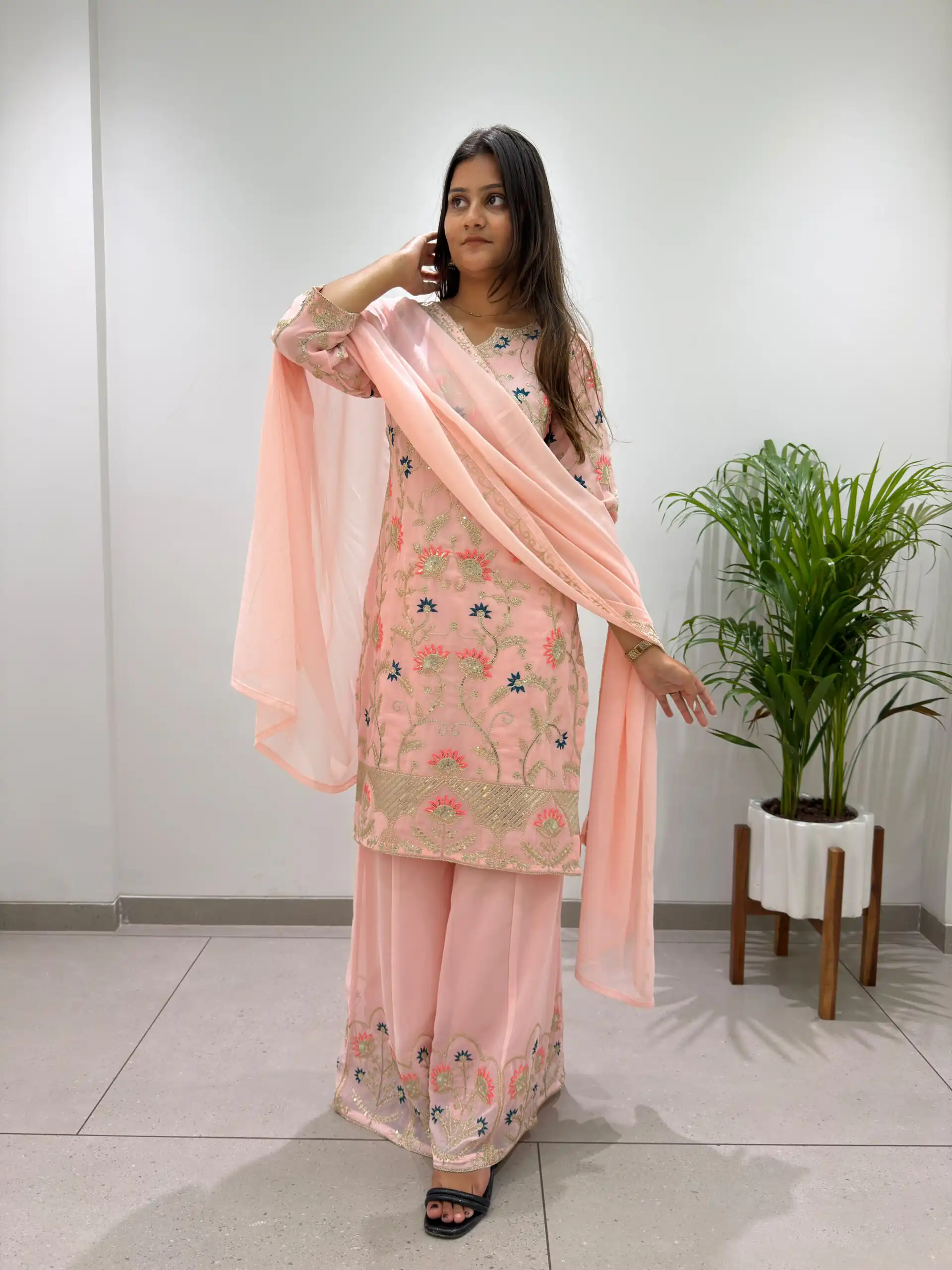 Pretty Peach Faux Georgette Sequence Work Salwar Suit