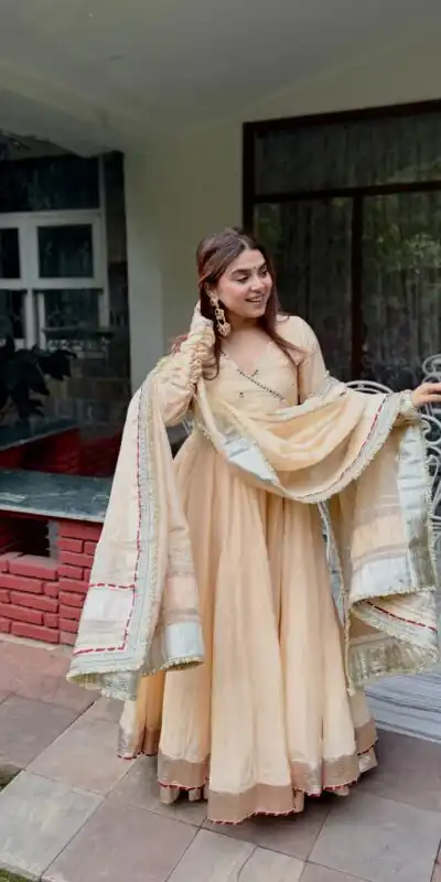 RTC 6048 Cream Tabby Organza Silk Gown with Hand Work & Mirror Work. Special Price ₹2549. Delivery 4-6 Working Days. Shop now. | Bollywood Gowns, Creative Gowns, Designer Gowns, Embroidered Gowns, Gowns, Party Wear Gowns