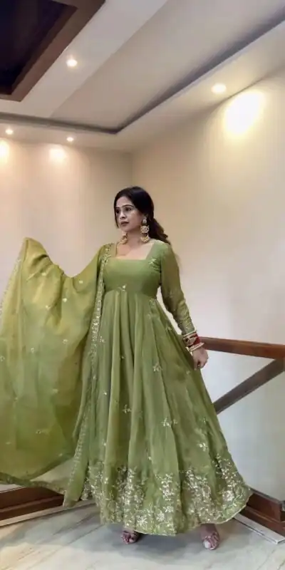 NSR 907 Mehendi Fendy Silk Gown with Embroidery Work & Sequins Work. Special Price ₹2399. Delivery 4-6 Working Days. Shop now. | Bollywood Gowns, Creative Gowns, Designer Gowns, Embroidered Gowns, Gowns, Party Wear Gowns