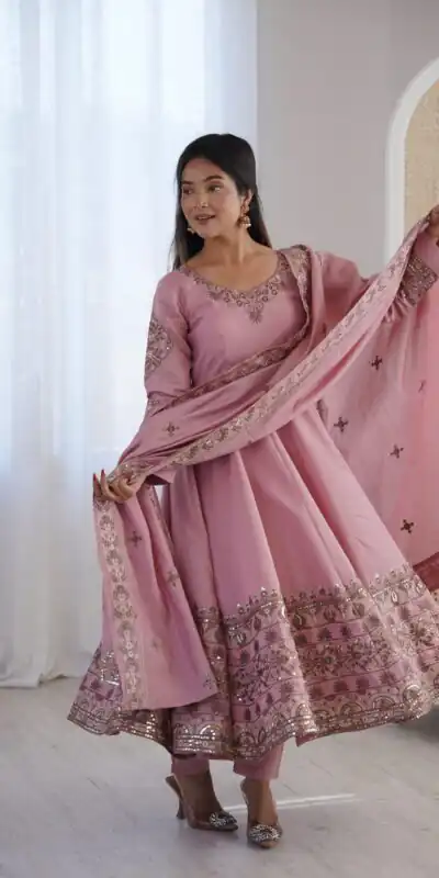 ZF 5016 Dusty Pink Roman Silk Gown with Embroidery Work. Wedding, Party, Festive, Events, Navratri, Offer ₹2499. Delivery 4-6 Working Days. Shop now. | Bollywood Gowns, Creative Gowns, Designer Gowns, Embroidered Gowns, Gowns, Party Wear Gowns