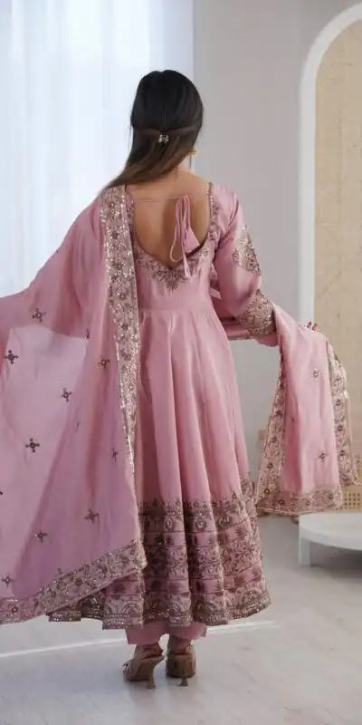 ZF 5016 Dusty Pink Roman Silk Gown with Embroidery Work. Wedding, Party, Festive, Events, Navratri, Offer ₹2499. Delivery 4-6 Working Days. Shop now. | Bollywood Gowns, Creative Gowns, Designer Gowns, Embroidered Gowns, Gowns, Party Wear Gowns