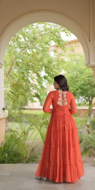 KA 1271 Orange in Colour Faux Georgette Bandhani Print Work Gown. Available at ₹2069 only. Delivery 4-6 Working Days. Shop now. | Bollywood Gowns, Creative Gowns, Designer Gowns, Embroidered Gowns, Gowns, Party Wear Gowns
