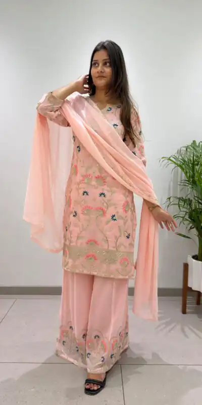 BE 486 Peach Faux Georgette Salwar Suit with Mirror Work & Embroidery Work. Get it for ₹2449. Delivery 4-6 Working Days. Shop now. | Casual Suits, Jump Suits, Creative suits, Designer Suits, Palazzo Suits, Party Wear Suits, Patiala Suits, Salwar suit, Straight Suits