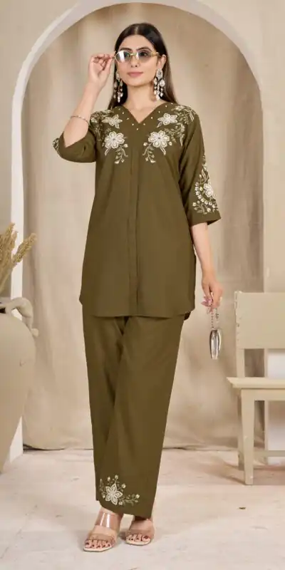 DIVA 169 Brown Colour Rayon Cotton Kurti with Embroidery Work. Introductory Price ₹1999. Delivery 4-6 Working Days. Shop now. | Bollywood Kurti, Creative Kurtis, Designer Kurti, Kurti, Party Wear Kurti, Selfie Kurti
