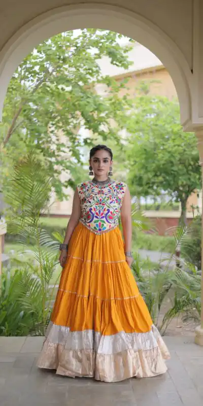 KA 5071 Orange Rayon Embroidery Work & Cowrie Work Lehenga Choli . Grab it for ₹2849. Delivery 4-6 Working Days. Shop now. | Bollywood Lehenga, Creative Lehenga, Designer Lehenga, Embroidered Lehenga, Lehenga, Party Wear Lehenga