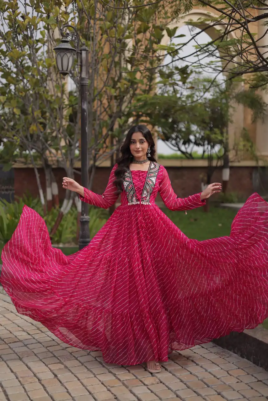 Shiny Pink Faux Georgette Laheriya Print Work Gown