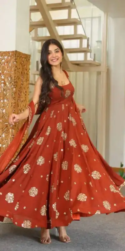 ZSR 3189 Rust Doremon Crush Gown with Lace Work & Mirror Work. Exclusive Offer ₹2399. Delivery 4-6 Working Days. Shop now. | Bollywood Gowns, Creative Gowns, Designer Gowns, Embroidered Gowns, Gowns, Party Wear Gowns