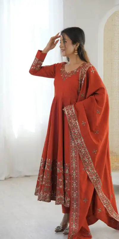 ZF 5016 Orange Roman Silk Gown with Embroidery Work. Wedding, Party, Festive, Events, Navratri, Exclusive Offer ₹2499. Delivery 4-6 Working Days. Shop now. | Bollywood Gowns, Creative Gowns, Designer Gowns, Embroidered Gowns, Gowns, Party Wear Gowns