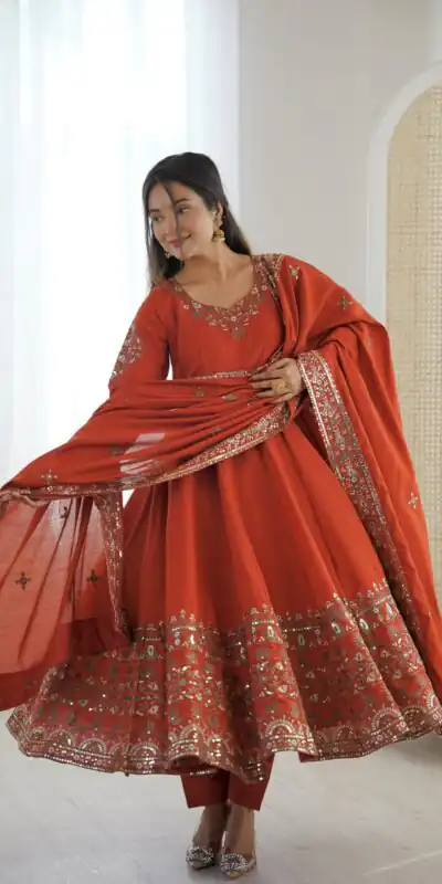 ZF 5016 Orange Roman Silk Gown with Embroidery Work. Wedding, Party, Festive, Events, Navratri, Exclusive Offer ₹2499. Delivery 4-6 Working Days. Shop now. | Bollywood Gowns, Creative Gowns, Designer Gowns, Embroidered Gowns, Gowns, Party Wear Gowns