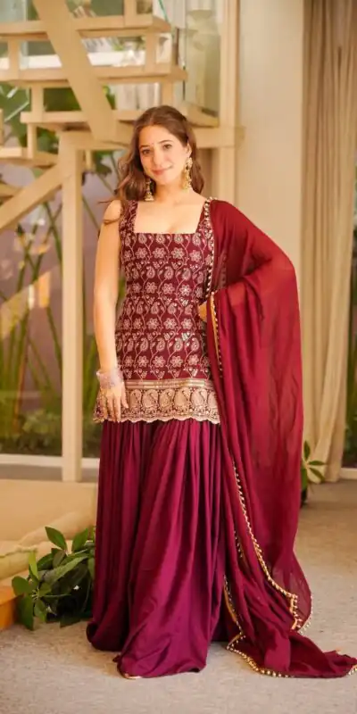 ST 1192 Maroon Faux Georgette Salwar Suit with Embroidery Work. Available at ₹2349 only. Delivery 4-6 Working Days. Shop now. | Casual Suits, Jump Suits, Tops & Bottoms, Track Suits, Trendy Wear, Creative suits, Designer Suits, Palazzo Suits, Party Wear Suits, Patiala Suits, Salwar suit, Straight Suits