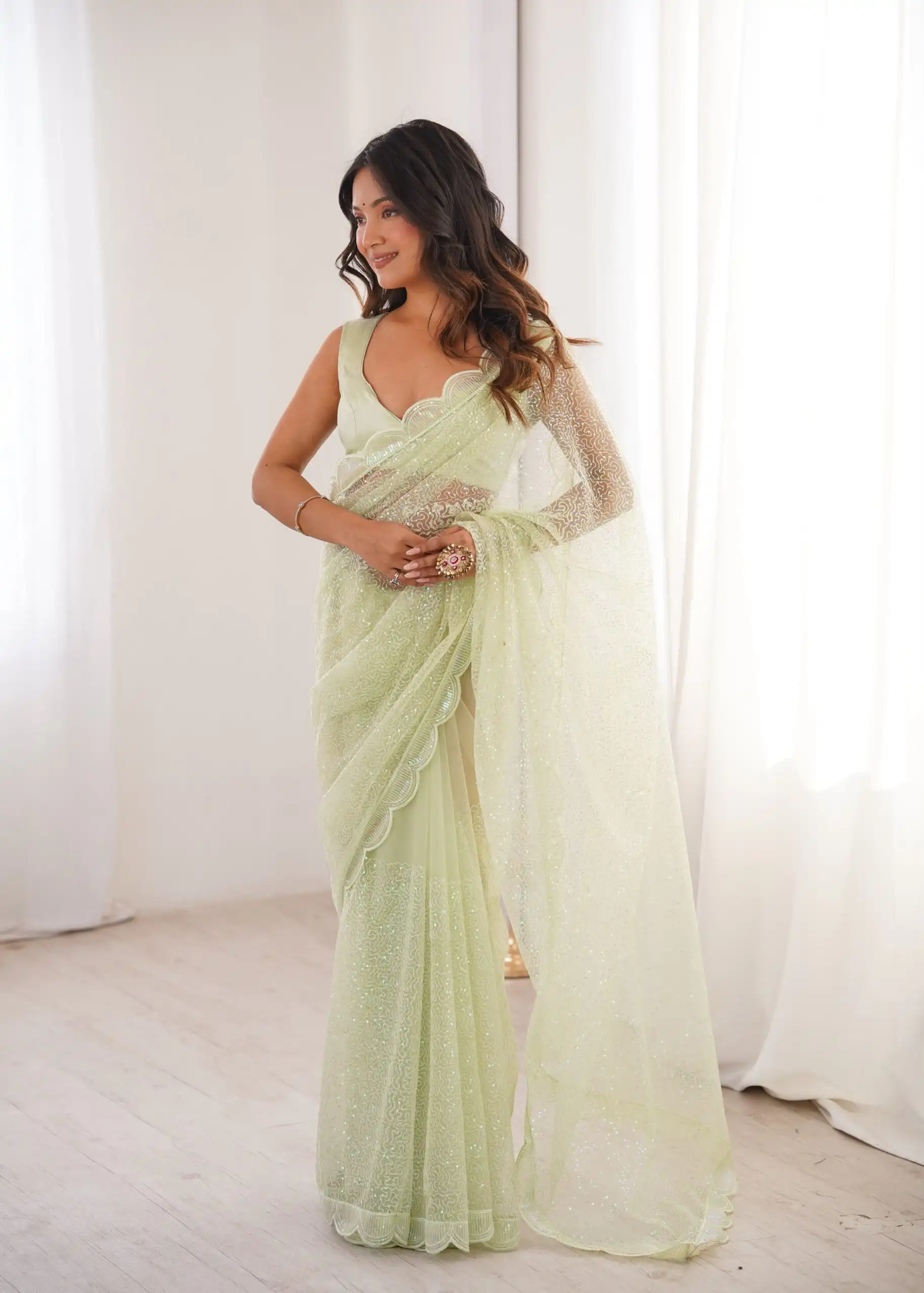 Shiny Pista Soft Net Sequins Work Saree