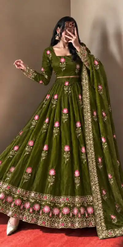 SR 1724 Mehendi Faux Georgette Gown with Mirror Work & Embroidery Work. Get it for ₹2799. Delivery 4-6 Working Days. Online Shop now. | Bollywood Gowns, Creative Gowns, Designer Gowns, Embroidered Gowns, Gowns, Party Wear Gowns