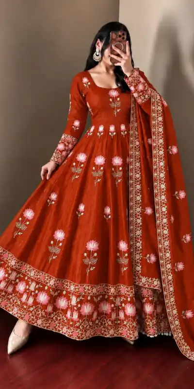 SR 1724 Rust Faux Georgette Gown with Mirror Work & Embroidery Work. Get it for ₹2799. Delivery 4-6 Working Days. Online Shop now. | Bollywood Gowns, Creative Gowns, Designer Gowns, Embroidered Gowns, Gowns, Party Wear Gowns