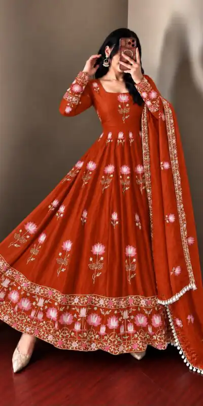 SR 1724 Rust Faux Georgette Gown with Mirror Work & Embroidery Work. Get it for ₹2799. Delivery 4-6 Working Days. Online Shop now. | Bollywood Gowns, Creative Gowns, Designer Gowns, Embroidered Gowns, Gowns, Party Wear Gowns