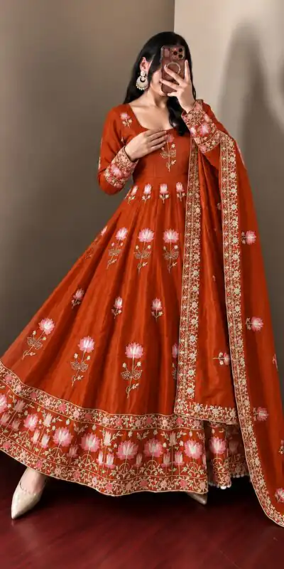 SR 1724 Rust Faux Georgette Gown with Mirror Work & Embroidery Work. Get it for ₹2799. Delivery 4-6 Working Days. Online Shop now. | Bollywood Gowns, Creative Gowns, Designer Gowns, Embroidered Gowns, Gowns, Party Wear Gowns