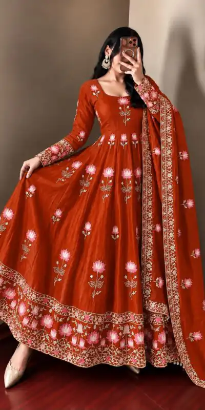 SR 1724 Rust Faux Georgette Gown with Mirror Work & Embroidery Work. Get it for ₹2799. Delivery 4-6 Working Days. Online Shop now. | Bollywood Gowns, Creative Gowns, Designer Gowns, Embroidered Gowns, Gowns, Party Wear Gowns