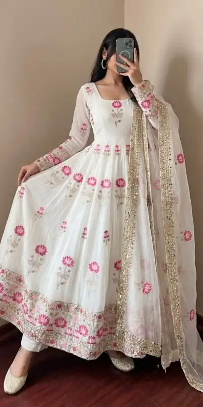 SR 1724 White Faux Georgette Gown with Mirror Work & Embroidery Work. Get it for ₹2799. Delivery 4-6 Working Days. Online Shop now. | Bollywood Gowns, Creative Gowns, Designer Gowns, Embroidered Gowns, Gowns, Party Wear Gowns