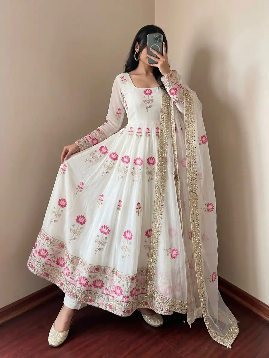 SR 1724 White Faux Georgette Gown with Mirror Work & Embroidery Work. Get it for ₹2799. Delivery 4-6 Working Days. Online Shop now. | Bollywood Gowns, Creative Gowns, Designer Gowns, Embroidered Gowns, Gowns, Party Wear Gowns