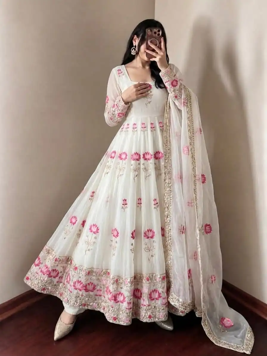 SR 1724 White Faux Georgette Gown with Mirror Work & Embroidery Work. Get it for ₹2799. Delivery 4-6 Working Days. Online Shop now. | Bollywood Gowns, Creative Gowns, Designer Gowns, Embroidered Gowns, Gowns, Party Wear Gowns