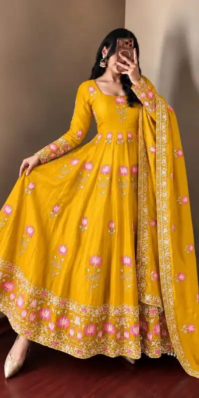 SR 1724 Yellow Faux Georgette Gown with Mirror Work & Embroidery Work. Get it for ₹2799. Delivery 4-6 Working Days. Online Shop now. | Bollywood Gowns, Creative Gowns, Designer Gowns, Embroidered Gowns, Gowns, Party Wear Gowns