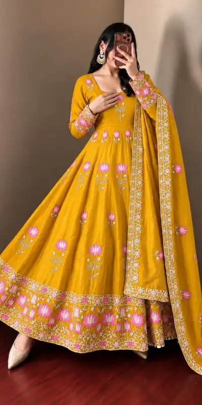 SR 1724 Yellow Faux Georgette Gown with Mirror Work & Embroidery Work. Get it for ₹2799. Delivery 4-6 Working Days. Online Shop now. | Bollywood Gowns, Creative Gowns, Designer Gowns, Embroidered Gowns, Gowns, Party Wear Gowns