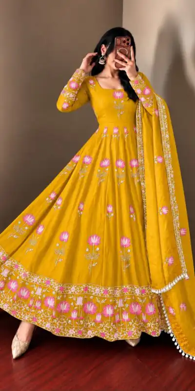 SR 1724 Yellow Faux Georgette Gown with Mirror Work & Embroidery Work. Get it for ₹2799. Delivery 4-6 Working Days. Online Shop now. | Bollywood Gowns, Creative Gowns, Designer Gowns, Embroidered Gowns, Gowns, Party Wear Gowns