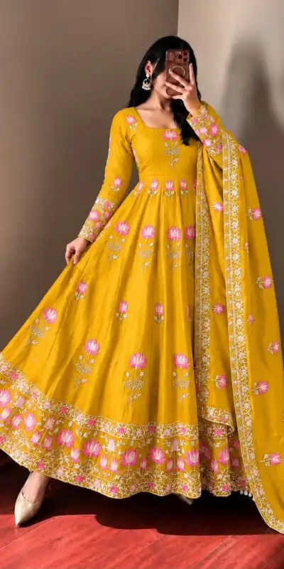 SR 1724 Yellow Faux Georgette Gown with Mirror Work & Embroidery Work. Get it for ₹2799. Delivery 4-6 Working Days. Online Shop now. | Bollywood Gowns, Creative Gowns, Designer Gowns, Embroidered Gowns, Gowns, Party Wear Gowns