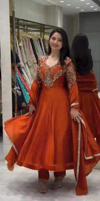 AD 252 Rust Roman Silk Gown with Mirror Work & Embroidery Work. Special Price ₹2999. Delivery 4-6 Working Days. Shop now. | Bollywood Gowns, Creative Gowns, Designer Gowns, Embroidered Gowns, Gowns, Party Wear Gowns