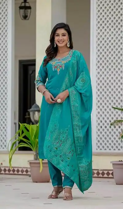 DIVA 121 Firozi Roman Silk Salwar Suit with Sequins Work & Embroidery Work. Available at ₹1899 only. Delivery 4-6 Working Days. Shop now. | Casual Suits, Jump Suits, Creative suits, Designer Suits, Palazzo Suits, Party Wear Suits, Patiala Suits, Salwar suit, Straight Suits
