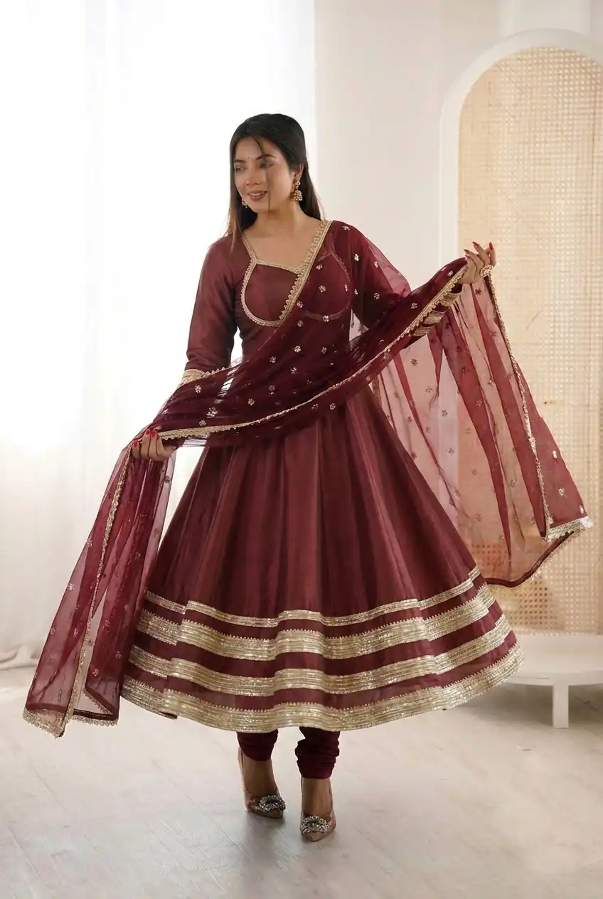 ZF 5017 Maroon Color Cosmos Gold Gown with Embroidery Work & Lace Work. Get it for ₹2099. Delivery 4-6 Working Days. Shop now. | Bollywood Gowns, Creative Gowns, Designer Gowns, Embroidered Gowns, Gowns, Party Wear Gowns