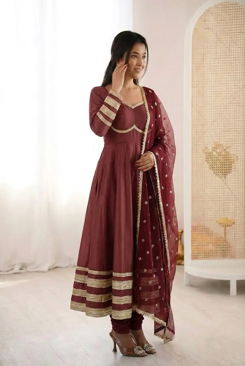 ZF 5017 Maroon Color Cosmos Gold Gown with Embroidery Work & Lace Work. Get it for ₹2099. Delivery 4-6 Working Days. Shop now. | Bollywood Gowns, Creative Gowns, Designer Gowns, Embroidered Gowns, Gowns, Party Wear Gowns