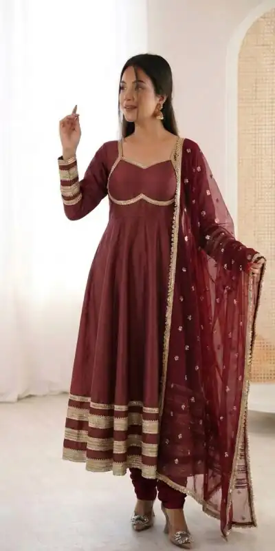 ZF 5017 Maroon Color Cosmos Gold Gown with Embroidery Work & Lace Work. Get it for ₹2099. Delivery 4-6 Working Days. Shop now. | Bollywood Gowns, Creative Gowns, Designer Gowns, Embroidered Gowns, Gowns, Party Wear Gowns