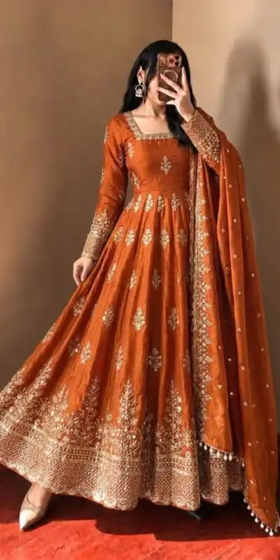 NSR 918 Orange Fendy Silk Gown with Embroidery Work & Sequins Work. Special Price ₹2399. Delivery 4-6 Working Days. Shop now. | Bollywood Gowns, Creative Gowns, Designer Gowns, Embroidered Gowns, Gowns, Party Wear Gowns