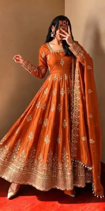 NSR 918 Orange Fendy Silk Gown with Embroidery Work & Sequins Work. Special Price ₹2399. Delivery 4-6 Working Days. Shop now. | Bollywood Gowns, Creative Gowns, Designer Gowns, Embroidered Gowns, Gowns, Party Wear Gowns