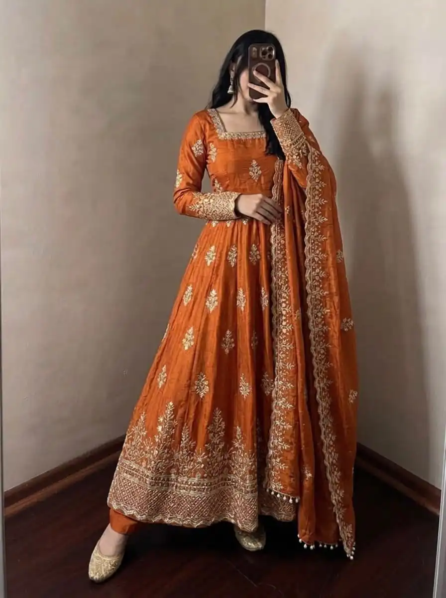 NSR 918 Orange Fendy Silk Gown with Embroidery Work & Sequins Work. Special Price ₹2399. Delivery 4-6 Working Days. Shop now. | Bollywood Gowns, Creative Gowns, Designer Gowns, Embroidered Gowns, Gowns, Party Wear Gowns