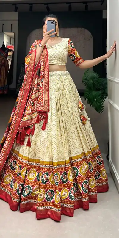 Angelic Yellow Color Tussar Silk With Heavy Tassels patola printed  Lehenga Choli