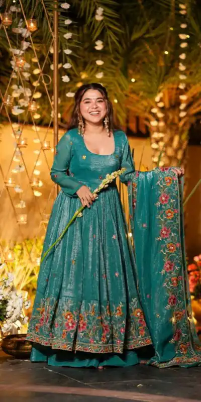 NSR 880 Firozi Crunchy Silk Gown with Embroidery Work. Wedding, Party, Festive, Events Grab it for ₹2249. Delivery 4-6 Working Days. Shop now. | Bollywood Gowns, Creative Gowns, Designer Gowns, Embroidered Gowns, Gowns, Party Wear Gowns